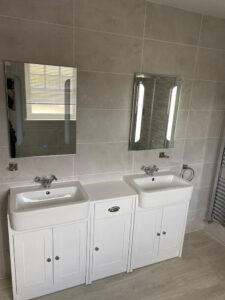 A double sink vanity unit with ample storage space