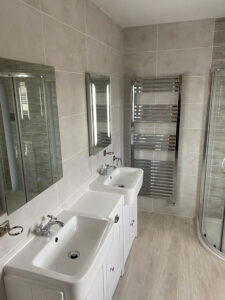 A double sink vanity unit with ample storage space