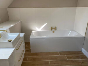 Sink and Bath with gold fixtures